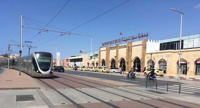 Rabat-Salé tram at station. Modern tram in Rabat, Morocco, near the Gare de Salé Ville station with taxis and pedestrians.